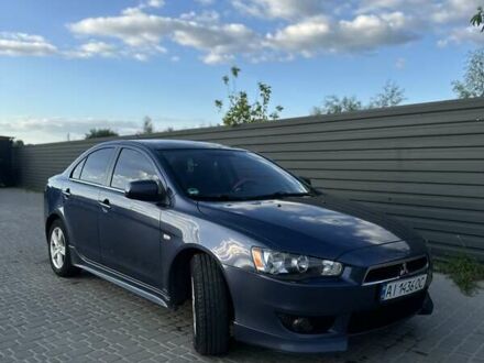 Синий Мицубиси Лансер, объемом двигателя 1.97 л и пробегом 260 тыс. км за 6000 $, фото 1 на Automoto.ua