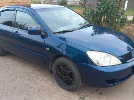 Синій Міцубісі Lancer, об'ємом двигуна 1.6 л та пробігом 220 тис. км за 4200 $, фото 1 на Automoto.ua
