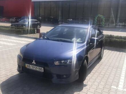 Синій Міцубісі Lancer, об'ємом двигуна 2 л та пробігом 142 тис. км за 8200 $, фото 1 на Automoto.ua