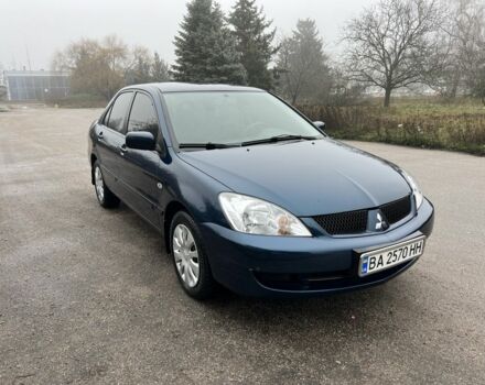 Синий Мицубиси Лансер, объемом двигателя 1.6 л и пробегом 126 тыс. км за 5950 $, фото 1 на Automoto.ua