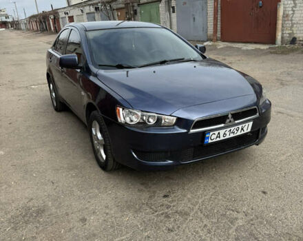 Синий Мицубиси Лансер, объемом двигателя 1.5 л и пробегом 215 тыс. км за 5200 $, фото 1 на Automoto.ua