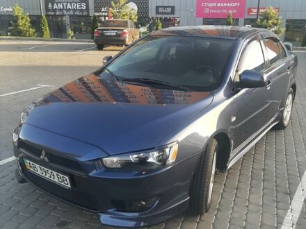 Синий Мицубиси Лансер, объемом двигателя 2 л и пробегом 142 тыс. км за 7500 $, фото 1 на Automoto.ua