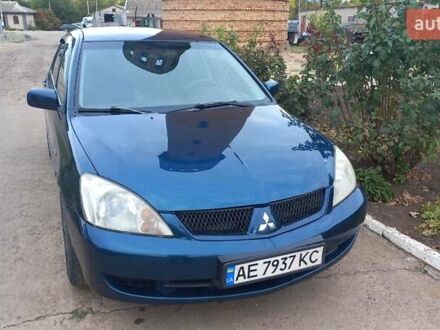 Синій Міцубісі Lancer, об'ємом двигуна 1.58 л та пробігом 220 тис. км за 4200 $, фото 1 на Automoto.ua