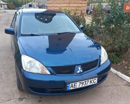 Синій Міцубісі Lancer, об'ємом двигуна 1.58 л та пробігом 220 тис. км за 4200 $, фото 1 на Automoto.ua
