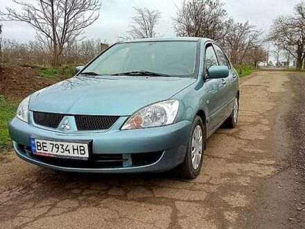 Синий Мицубиси Лансер, объемом двигателя 1.6 л и пробегом 167 тыс. км за 4700 $, фото 1 на Automoto.ua