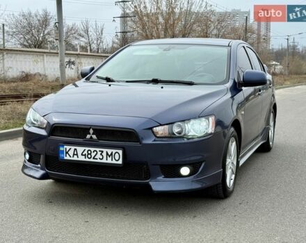 Синий Мицубиси Лансер, объемом двигателя 2 л и пробегом 290 тыс. км за 6999 $, фото 1 на Automoto.ua