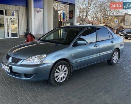 Синій Міцубісі Lancer, об'ємом двигуна 1.58 л та пробігом 166 тис. км за 5500 $, фото 1 на Automoto.ua