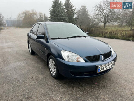 Синій Міцубісі Lancer, об'ємом двигуна 1.59 л та пробігом 126 тис. км за 5950 $, фото 1 на Automoto.ua