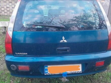 Синій Міцубісі Lancer, об'ємом двигуна 1.6 л та пробігом 283 тис. км за 4000 $, фото 1 на Automoto.ua