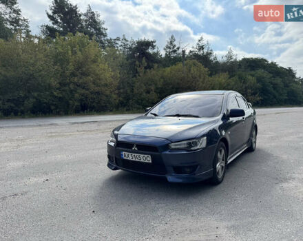 Синій Міцубісі Lancer, об'ємом двигуна 2 л та пробігом 299 тис. км за 7100 $, фото 1 на Automoto.ua