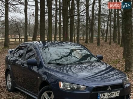 Синий Мицубиси Лансер, объемом двигателя 2 л и пробегом 243 тыс. км за 5800 $, фото 1 на Automoto.ua