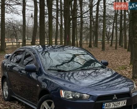 Синий Мицубиси Лансер, объемом двигателя 2 л и пробегом 243 тыс. км за 5800 $, фото 1 на Automoto.ua