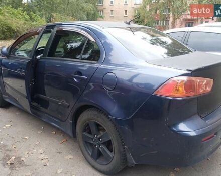 Синій Міцубісі Lancer, об'ємом двигуна 2 л та пробігом 265 тис. км за 5700 $, фото 1 на Automoto.ua