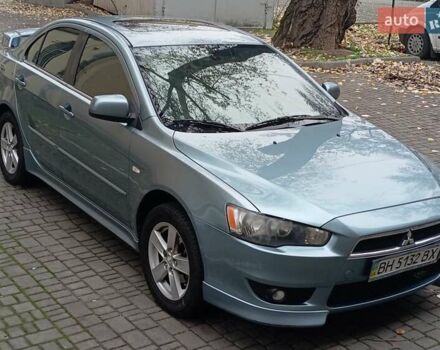 Синий Мицубиси Лансер, объемом двигателя 2 л и пробегом 300 тыс. км за 5600 $, фото 1 на Automoto.ua