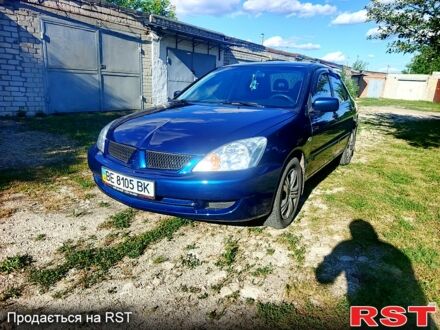 Синій Міцубісі Lancer, об'ємом двигуна 1.6 л та пробігом 150 тис. км за 4600 $, фото 1 на Automoto.ua