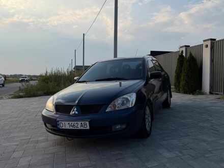 Синій Міцубісі Lancer, об'ємом двигуна 1.58 л та пробігом 430 тис. км за 3000 $, фото 1 на Automoto.ua