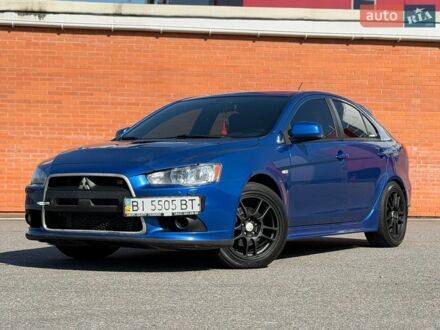 Синій Міцубісі Lancer, об'ємом двигуна 2 л та пробігом 140 тис. км за 12900 $, фото 1 на Automoto.ua