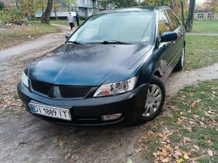 Синій Міцубісі Lancer, об'ємом двигуна 1.58 л та пробігом 250 тис. км за 4200 $, фото 1 на Automoto.ua