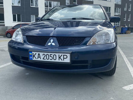 Синій Міцубісі Lancer, об'ємом двигуна 1.6 л та пробігом 206 тис. км за 5500 $, фото 1 на Automoto.ua