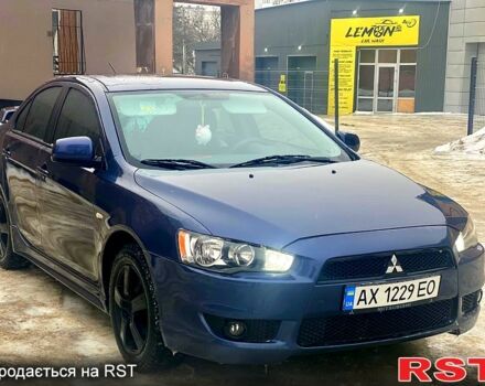 Синий Мицубиси Лансер, объемом двигателя 2 л и пробегом 20000 тыс. км за 7200 $, фото 1 на Automoto.ua