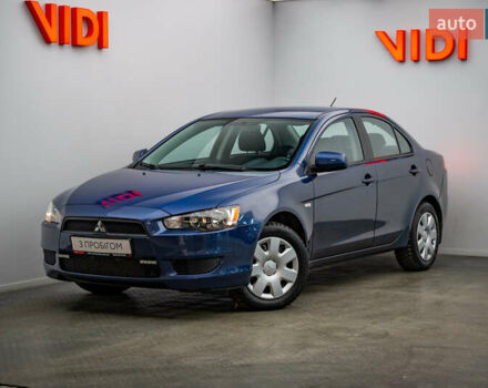 Синий Мицубиси Лансер, объемом двигателя 1.5 л и пробегом 65 тыс. км за 8076 $, фото 1 на Automoto.ua