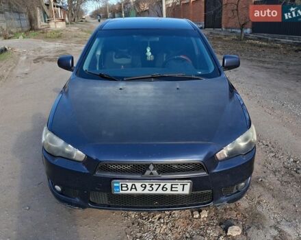 Синий Мицубиси Лансер, объемом двигателя 2 л и пробегом 248 тыс. км за 6600 $, фото 1 на Automoto.ua