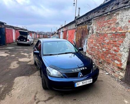 Синий Мицубиси Лансер, объемом двигателя 1.6 л и пробегом 189 тыс. км за 4200 $, фото 1 на Automoto.ua