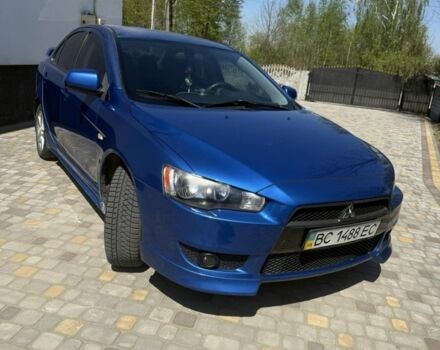 Синій Міцубісі Lancer, об'ємом двигуна 2 л та пробігом 220 тис. км за 5999 $, фото 1 на Automoto.ua