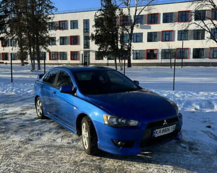 Синий Мицубиси Лансер, объемом двигателя 2 л и пробегом 209 тыс. км за 6600 $, фото 1 на Automoto.ua