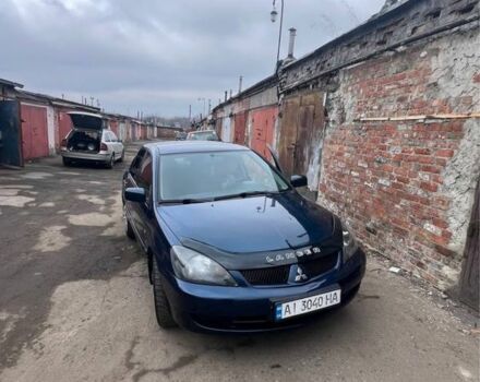 Синий Мицубиси Лансер, объемом двигателя 1.6 л и пробегом 180 тыс. км за 4200 $, фото 1 на Automoto.ua