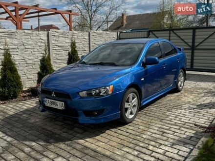 Синій Міцубісі Lancer, об'ємом двигуна 2 л та пробігом 209 тис. км за 6700 $, фото 1 на Automoto.ua