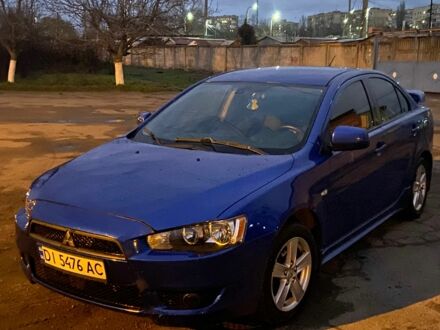 Синий Мицубиси Лансер, объемом двигателя 2 л и пробегом 176 тыс. км за 5300 $, фото 1 на Automoto.ua