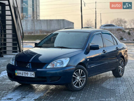 Міцубісі Lancer 2009 у Дніпро (Дніпропетровську) на Automoto.ua Синій Міцубісі Lancer, об'ємом двигуна 1.6 л та пробігом 250 тис. км за 5499 $, фото 1 на Automoto.ua