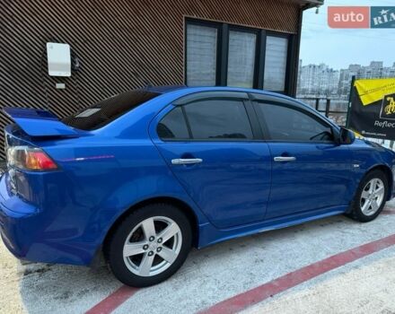 Синий Мицубиси Лансер, объемом двигателя 2 л и пробегом 192 тыс. км за 8000 $, фото 1 на Automoto.ua