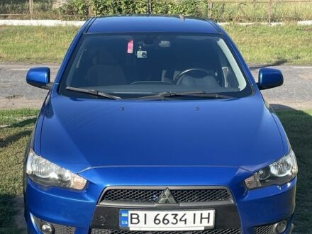 Синій Міцубісі Lancer, об'ємом двигуна 1.8 л та пробігом 228 тис. км за 8300 $, фото 1 на Automoto.ua