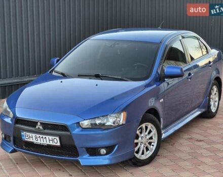 Синій Міцубісі Lancer, об'ємом двигуна 2 л та пробігом 250 тис. км за 7699 $, фото 1 на Automoto.ua