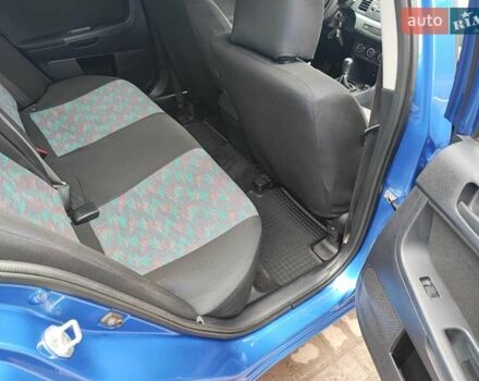 Синий Мицубиси Лансер, объемом двигателя 1.5 л и пробегом 141 тыс. км за 6600 $, фото 1 на Automoto.ua