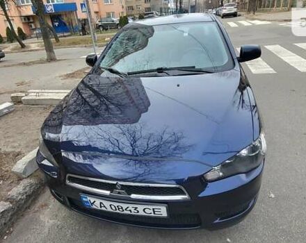 Синій Міцубісі Lancer, об'ємом двигуна 2 л та пробігом 150 тис. км за 8500 $, фото 1 на Automoto.ua