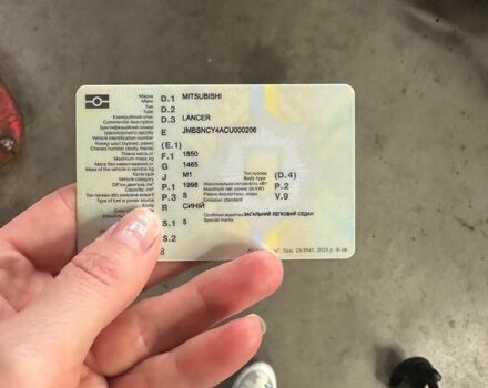 Синий Мицубиси Лансер, объемом двигателя 2 л и пробегом 194 тыс. км за 7800 $, фото 1 на Automoto.ua