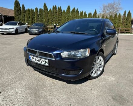 Синий Мицубиси Лансер, объемом двигателя 2 л и пробегом 232 тыс. км за 7200 $, фото 1 на Automoto.ua