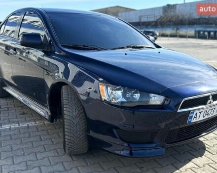 Синий Мицубиси Лансер, объемом двигателя 2 л и пробегом 170 тыс. км за 8700 $, фото 1 на Automoto.ua