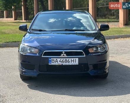 Синий Мицубиси Лансер, объемом двигателя 2 л и пробегом 98 тыс. км за 8000 $, фото 1 на Automoto.ua