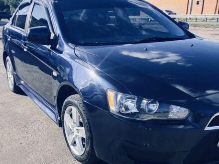 Синій Міцубісі Lancer, об'ємом двигуна 2.4 л та пробігом 185 тис. км за 7300 $, фото 1 на Automoto.ua