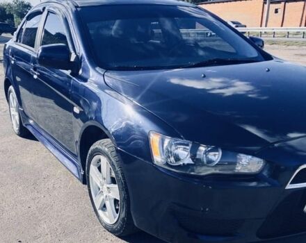 Синий Мицубиси Лансер, объемом двигателя 2.4 л и пробегом 185 тыс. км за 7300 $, фото 1 на Automoto.ua