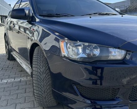 Синий Мицубиси Лансер, объемом двигателя 2 л и пробегом 170 тыс. км за 7950 $, фото 1 на Automoto.ua