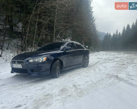 Синий Мицубиси Лансер, объемом двигателя 2 л и пробегом 168 тыс. км за 9555 $, фото 1 на Automoto.ua