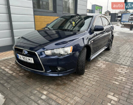 Синий Мицубиси Лансер, объемом двигателя 1.8 л и пробегом 209 тыс. км за 10200 $, фото 1 на Automoto.ua