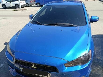 Синий Мицубиси Лансер, объемом двигателя 2 л и пробегом 130 тыс. км за 7800 $, фото 1 на Automoto.ua