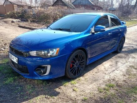 Синий Мицубиси Лансер, объемом двигателя 2.4 л и пробегом 130 тыс. км за 11700 $, фото 1 на Automoto.ua