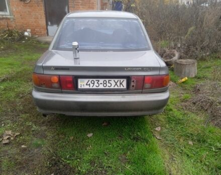 Зеленый Мицубиси Лансер, объемом двигателя 0 л и пробегом 111 тыс. км за 700 $, фото 2 на Automoto.ua